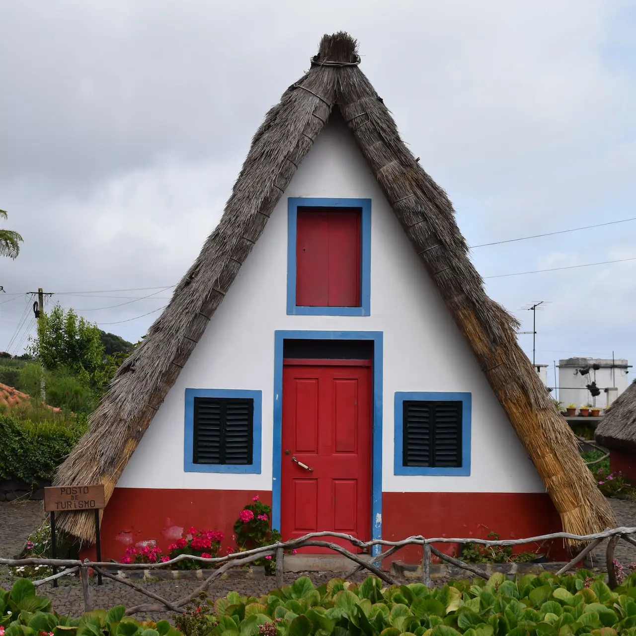 red and brown house under gray sky