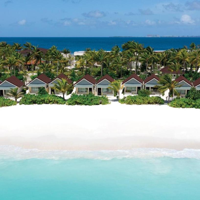 Oblu Experience Ailafushi bungalow beach.jpg