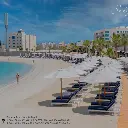 Solymar distante plaja.webp